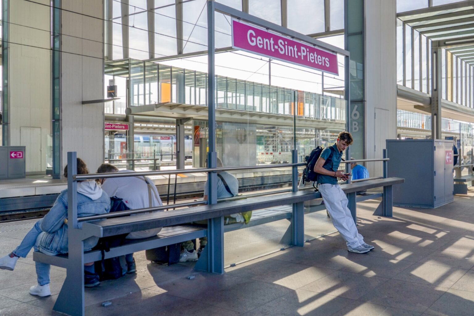 Newcomers waiting on the platform at Gent-Sint-Pieters station